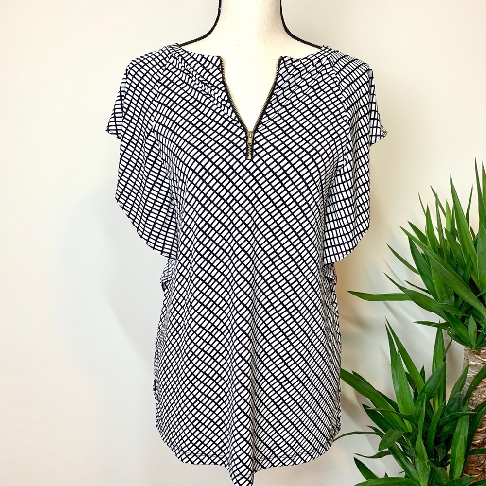 Woman cute tunic blouse with flutter sleeves